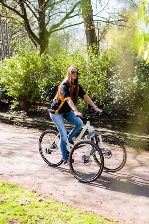 Photo shows Paula balancing well on the trike 